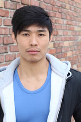 Man with neutral expression closeup
