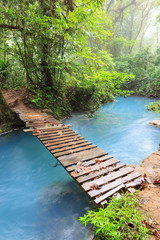 Rio celeste and small wooden bridge