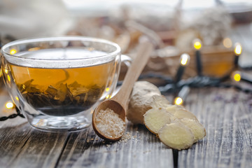 still life with transparent Cup of tea on wooden background