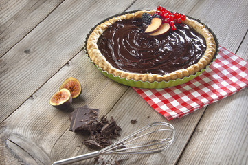 chocolate tart on a wooden table