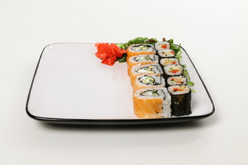 The white plate with mix sushi