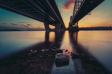 Bridges over river Dniepr. Sunset time. Kiev. Ukraine.
