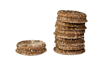 Chocolate cookies sprinkled with coconut isolated on white