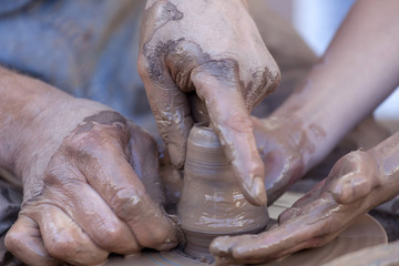 Pottery making, close up on hands