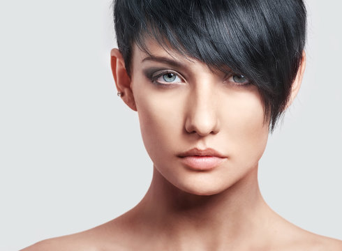 Beautiful young woman with short hairstyle