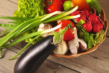Fresh vegetables on a clean wooden table