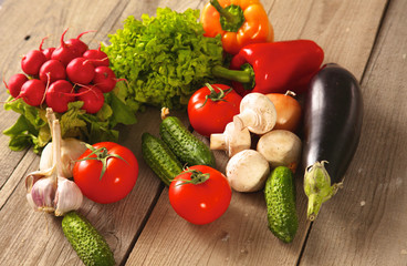 Fresh vegetables on a clean wooden table