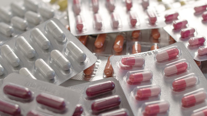 A lot of capsules and tablets in the pack