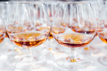 Glasses of brandy on a banquet. Catering