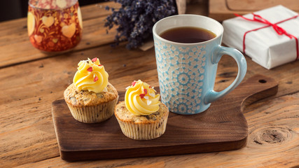 St Valentine Love cupcakes with red hearts and butter cream
