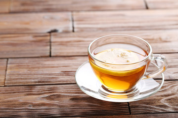 Cup of tea on brown wooden table