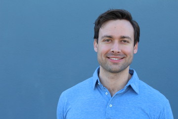 Joyful male smiling isolated close up with copy space 