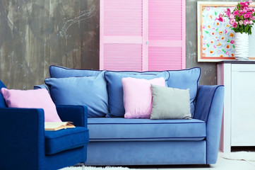 Modern room interior with pink wooden screen