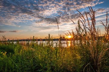 Sunset along Hudson River, facing New Jersey, from the west side greenway in New York City