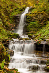 Fototapeta na wymiar Beautiful waterfall in Carpathians