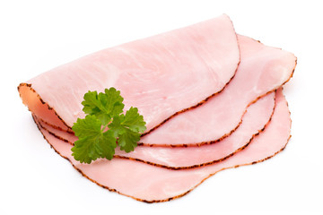 Thin slices of ham on white background.