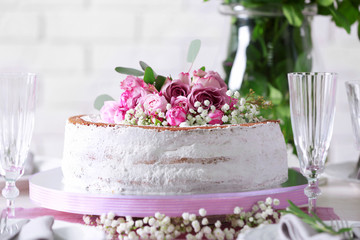 Delicious wedding cake on beautifully served table, closeup