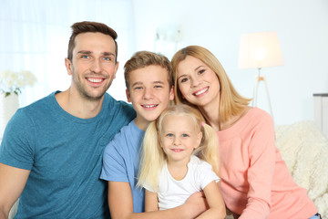 Cute happy family in living room