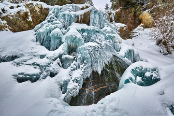 Frozen waterfall in the winter