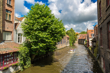 Tourist boat on canal in Bruges