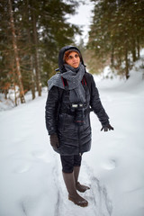 Fototapeta na wymiar Tourist woman hiking with camera