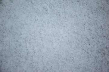 Texture of white snow as a background