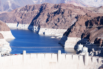 The Hoover Dam, the landscape. Boulder Dam is among the hills of black canyon. 