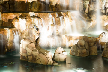 Fototapeta na wymiar Fountain is in Las Vegas. Night city landscape with waterfall. 