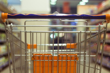 Abstract blurred photo of shopping cart/trolley in the shop