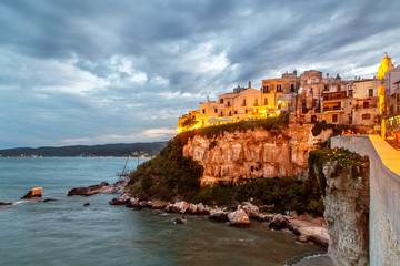 Night view of Vieste - main city of Capo Gargano, Apulia, Italy