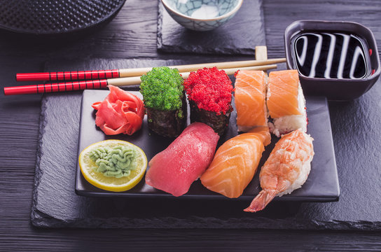 Japanese  sushi set on black tableware