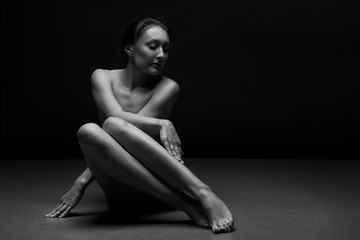 Naked woman body sculpture. Fine art photo of female body. 