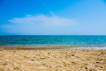 Adriatic Sea coast view. Seashore of Italy, summer sandy beach with clouds on horizon.