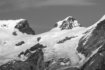 Landscape of Monte Rosa Group summits. Roccia Nera (Black Rock) and Polluce. Black and white image. Aosta valley, Italy