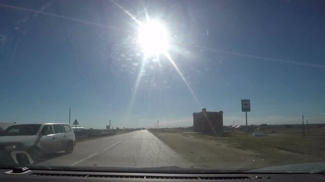 View from Car windshield. Road Trip on Suburban Road