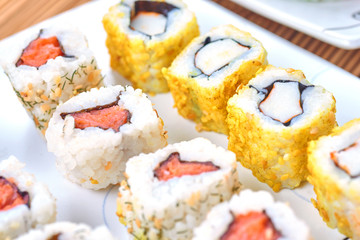 Sushi set on a white table