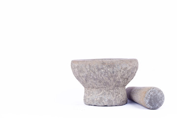 stone mortar and pestle are Thai cooking tool on white background food isolated 
