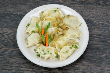 Cooked pierogies with meat