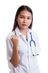 Portrait of confidence young female doctor hold fist.