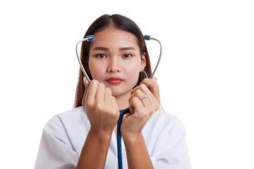 Young Asian female doctor show stethoscope focus at stethoscope.