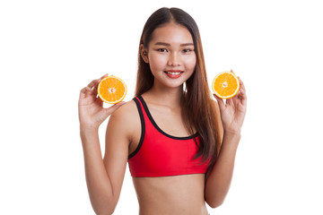Beautiful Asian healthy girl with orange fruit.
