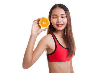 Asian healthy girl on diet with orange fruit.
