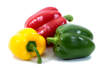 three bell peppers (paprika) isolated on white background