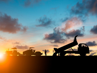 Silhouette machinery work construction road plan to connect over