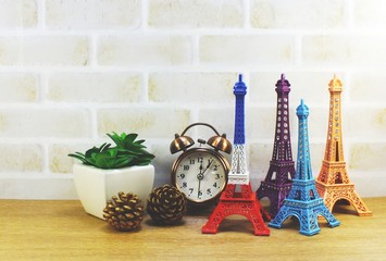 image of decorative eiffel tower and different home decor related objects