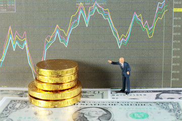 A businessman is taking profit from trading. conceptual image for investment of stock, forex, and bitcoin.
