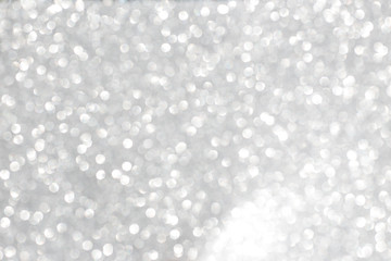 Fototapeta na wymiar white silver gradient glitter bokeh abstract texture background