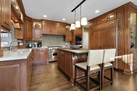 Kitchen With Oak Wood Cabinetry