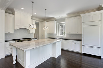 Kitchen with white cabinetry