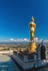 Golden buddha statue in Khao Noi temple, Nan Province, Thailand